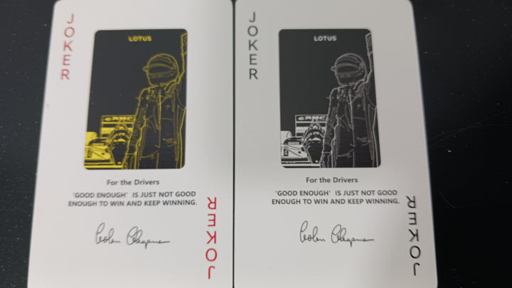Lotus playing cards race cars