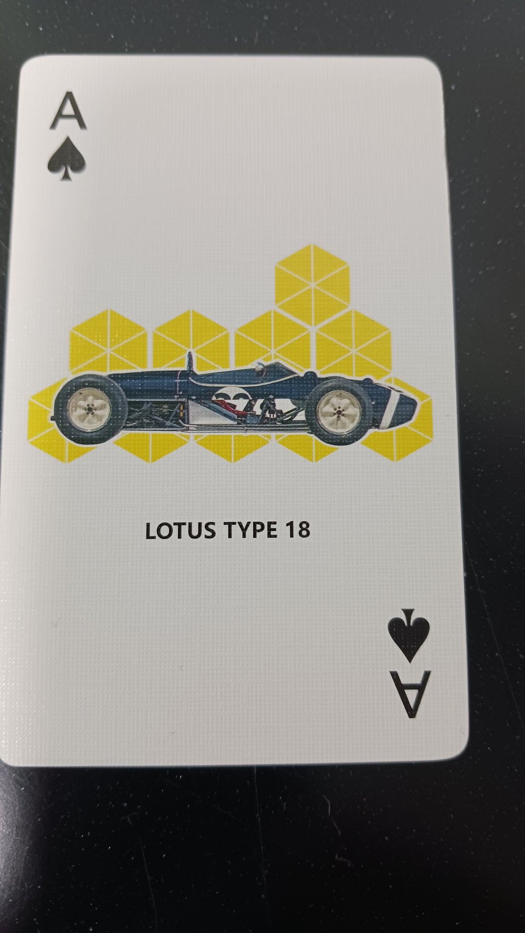 Lotus playing cards race cars