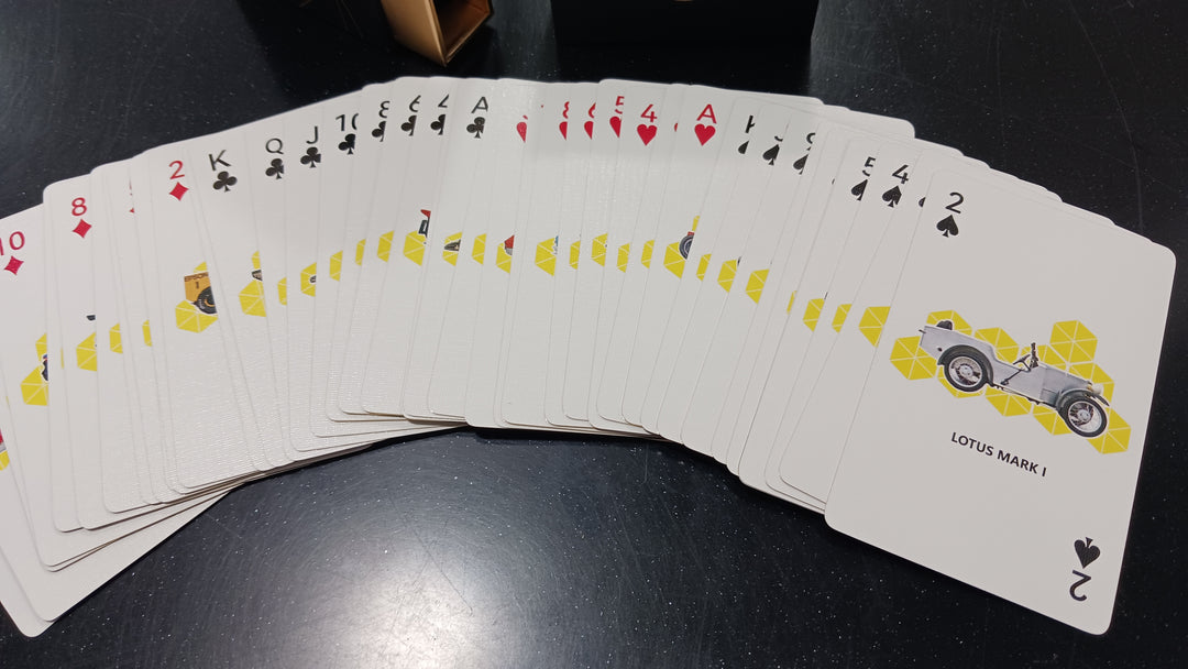 Lotus playing cards race cars